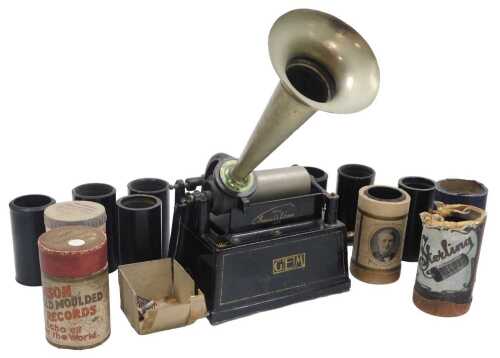 An Edison Gem phonograph, in black metal, decorated in gilt, mounted with a silver plated...