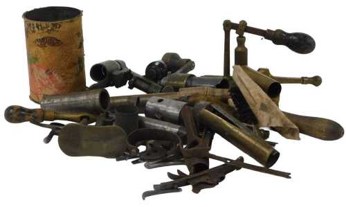 Cartridge and bullet making machinery, to include a cartridge turnover machine with clamp, and...