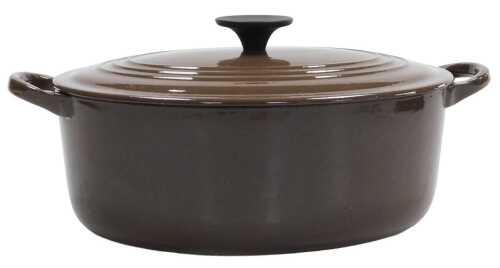 A Le Creuset brown enamel twin handled oval casserole dish, with composition knop, 34cm wide.