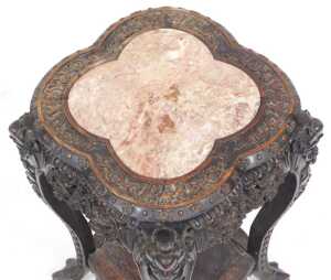 A late 19thC Chinese hardwood urn stand, the carved quatrelobe top inset with red and white... - 2