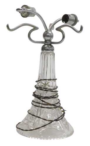 An early 20thC cut glass and chrome lamp base, with two bulb holders, lacking shade, 33cm high....