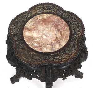A late 19thC Chinese hardwood urn stand, with a cinquefoil top carved with flowers and bamboo,... - 2