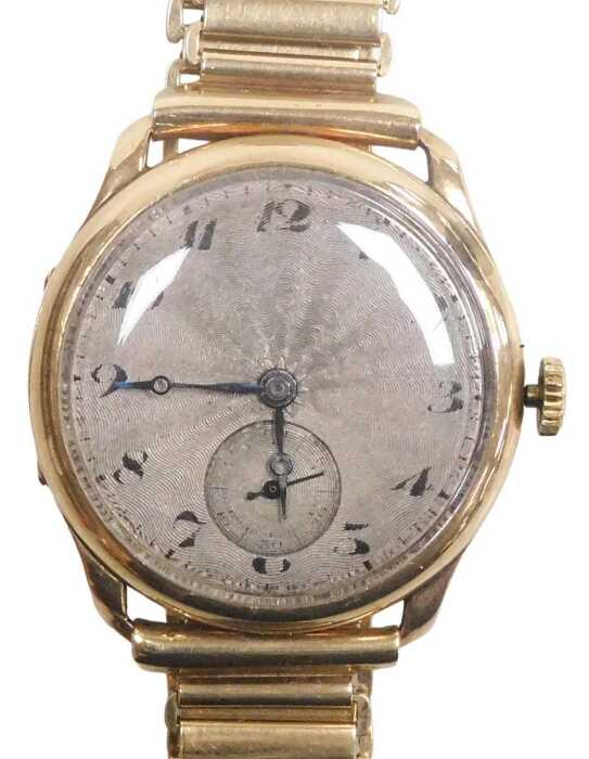 An early 20thC Rone 9ct gold cased wristwatch, circular silvered dial with engine turned...