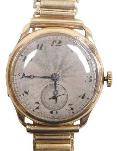 An early 20thC Rone 9ct gold cased wristwatch, circular silvered dial with engine turned...