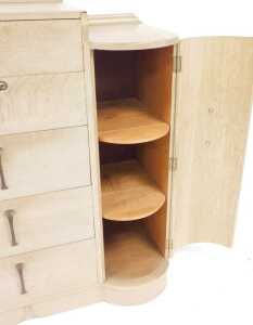 A Continental Art Deco limed oak chest, of six drawers, flanked by a demi lune cupboard, the... - 2