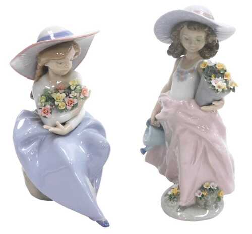 A Lladro porcelain figure of a girl holding a pot of flowers and a watering can, Collector's...