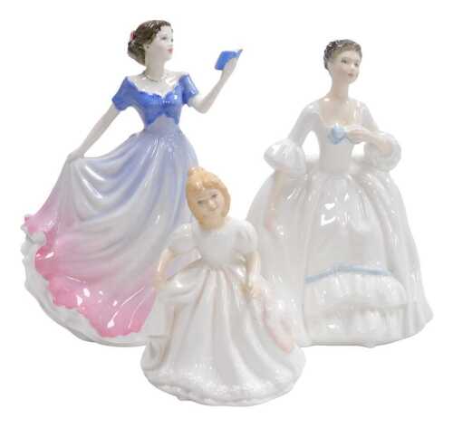 Three Royal Doulton porcelain figures, comprising Sweet Poetry HN4113, Kelly HN3222, and Amanda...