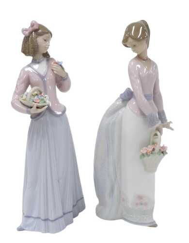 A Lladro porcelain figure of a girl holding a basket of flowers, Collector's Society figure 1994,...