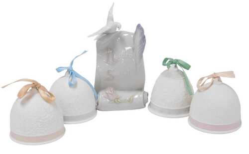 Four Lladro bisque porcelain bells, Collector's Society 1991-94, together with a Lladro Society...
