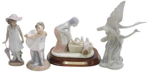 Two Nao porcelain figures, one of a ballerina, the other of a girl with a hat and parasol,...
