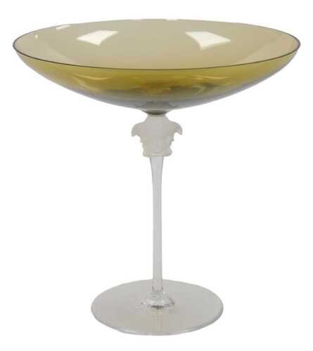 A Versace Rosenthal amber glass coupe, the shallow bowl raised on a slender stem capped with a...