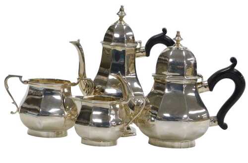 An Edward VII Queen Anne style silver four piece tea and coffee set, of octagonal pear shaped...