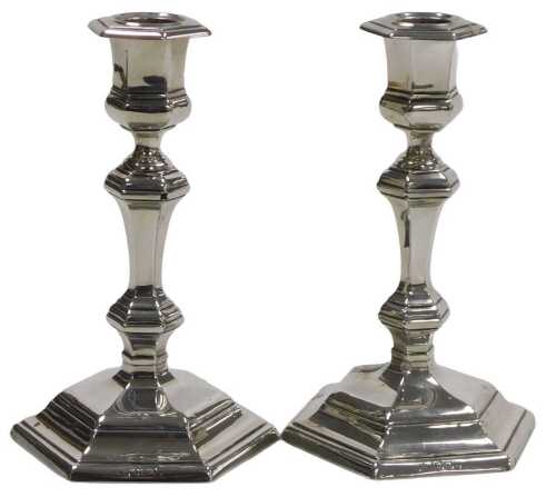 A pair of Victorian loaded silver candlesticks, of hexagonal baluster form, Mappin Brothers,...