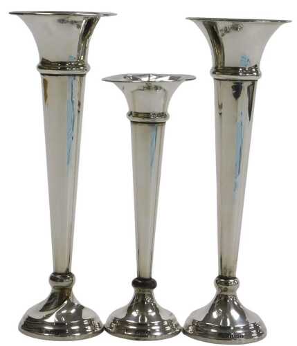 A pair of George V loaded silver bud vases, Birmingham 1922, 4.03oz all in, 17cm high, and a...