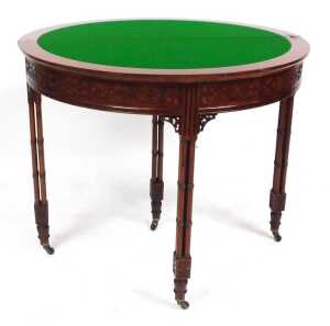 A Chippendale Revival mahogany demi lune foldover card table, with a green baize interior, above... - 2