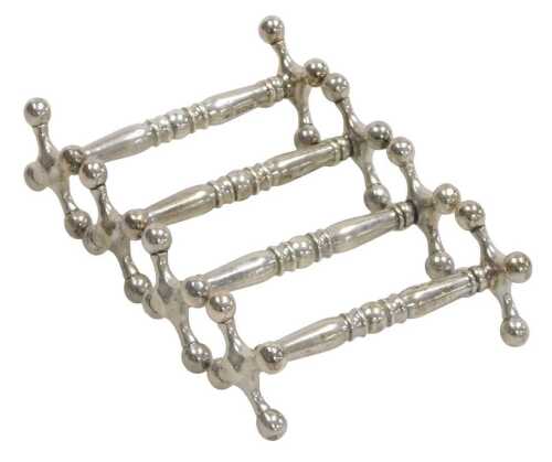 A set of four George V silver knife rests, with sputnik terminals, Sheffield 1924/25, 8.26oz.