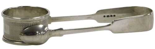 A pair of Victorian silver Old English pattern sugar tongs, London 1842, together with an...