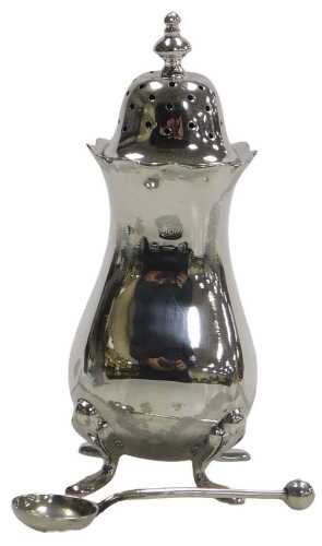 A George V silver pepperette, raised on four paw feet, Birmingham 1913, together with a silver...