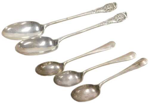 A pair of Victorian silver spoons, with mask head terminals, London 1893, together with three...