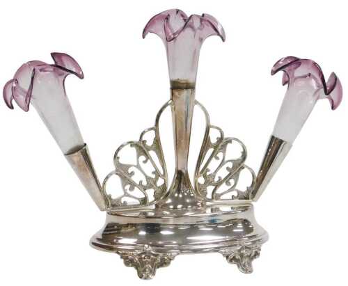A late 19thC Walker and Hall silver plated epergne, with three frilled, clear to amber glass...