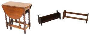 Two early 20thC oak book troughs, 72.5cm and 64cm wide, together with an early 20thC oak drop...