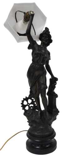 A late 19th/early 20thC French bronzed spelter figure of a lady beside a wheel, etc., later...