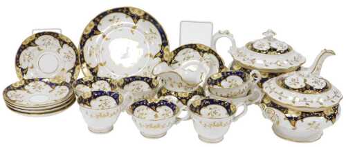 An early 19thC Ridgway porcelain part tea service, each piece decorated in yellow and cobalt...