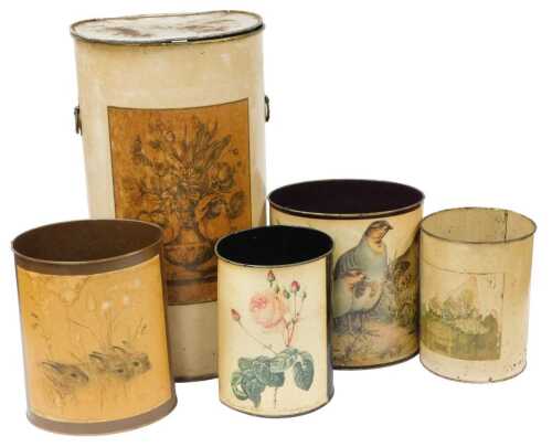 A group of cream painted toleware, to include a lidded waste paper bin, applied with a floral...