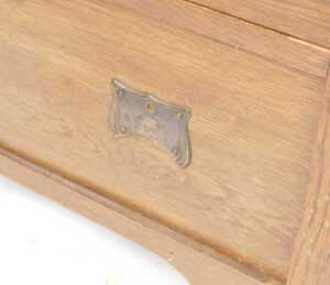 A Victorian Arts and Crafts oak chest, of three drawers, flanked by towel rails, raised on... - 3