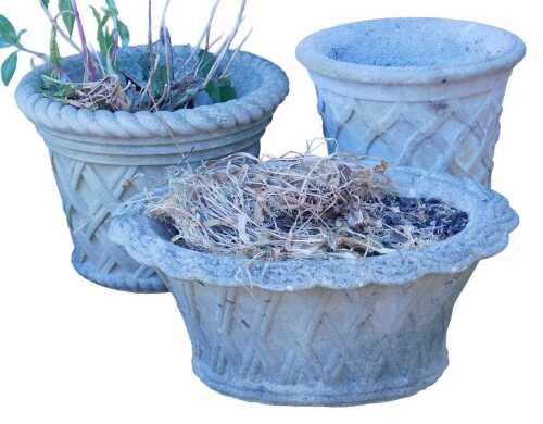 A composition garden pot or urn, decorated with a lattice design, 32cm high, 33cm wide, a...