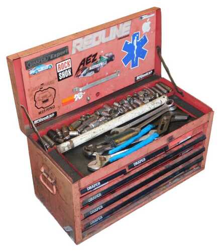 A Draper metal tool chest, containing a number of tools to include spanners, part socket set, etc.