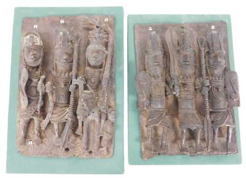 A Benin bronze plaque, cast with three warriors carrying spears, shields, swords, etc., 32cm x...