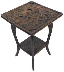 An early 20thC carved Japanese hardwood table, for Liberty's of London, the square top carved...