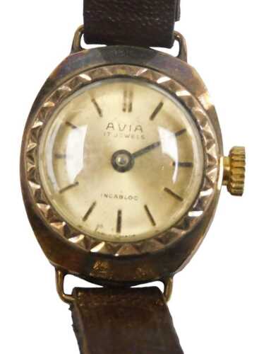 An Avia lady's 9ct gold cased wristwatch, circular champagne dial with gold baton markers,...
