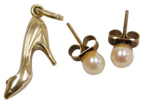 A 9ct gold stiletto shoe charm, together with a pair of cultured pearl earrings, set in yellow...