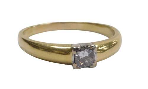 An 18ct gold and diamond solitaire ring, the asscher cut diamond in a solid high shouldered claw...