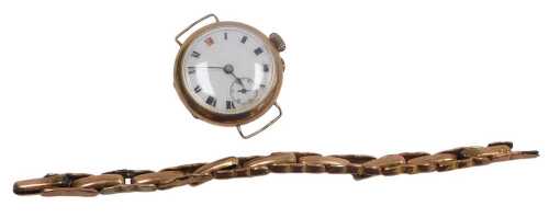 A 9ct rose gold lady's wristwatch, circular enamel dial bearing Roman numerals, subsidiary...