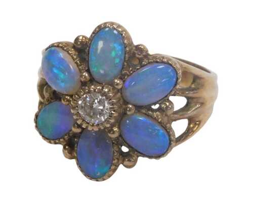 A 9ct gold opal and diamond flowerhead ring, size P, 5.0g.