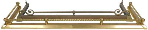 A brass fire curb, with ropetwist decoration and tapering base, 150cm wide, and an early 20thC...