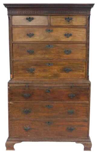 A George III Chippendale style mahogany chest on chest, with a moulded pediment and blind...