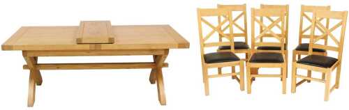 A light oak extending dining table, the planked top on X shaped supports, one loose leaf, 78cm...