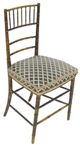 A 19thC gilt simulated bamboo side chair, with a padded seat, on turned legs.