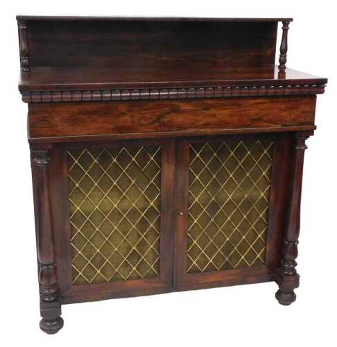 A William IV rosewood chiffonier, the raised back with turned supports, the base with a raised...
