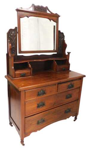 A late 19thC walnut dressing table, the top with a rectangular arched mirror with bevelled plate,...