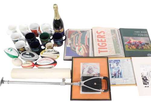 Assorted Leicester Tigers rugby football memorabilia, including mugs, miniature balls, and a...