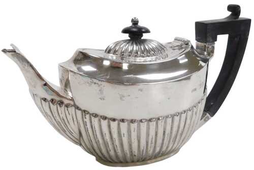 A Victorian silver semi fluted teapot, monogram engraved, Josiah Williams & Company, London 1896,...