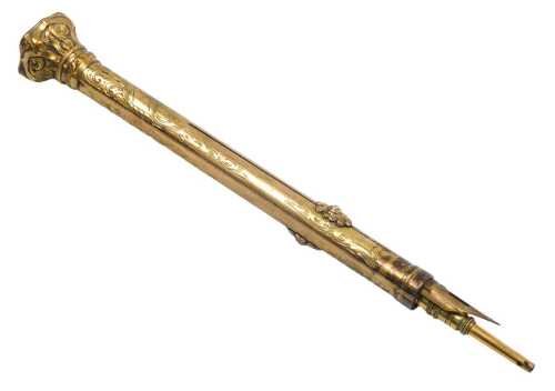 A late 19thC gilt metal propelling pencil and pen, with foliate engraving, and a blodstone...