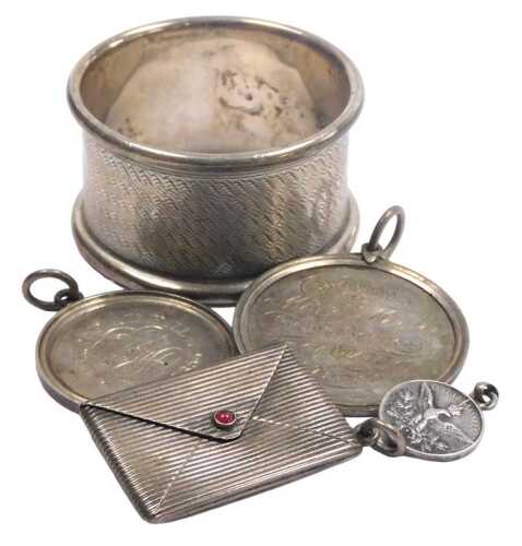 A George V silver napkin ring, with engine turned decoration, Sheffield 1916, 0.50oz, together...
