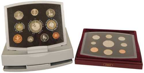 A Royal Mint Millennium 2000 executive proof coin set, cased, and a 2002 United Kingdom proof...