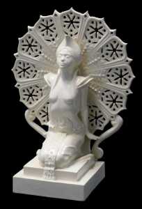 A cream glazed ceramic figure of a semi nude Oriental dancer, modelled kneeling on a plinth in...